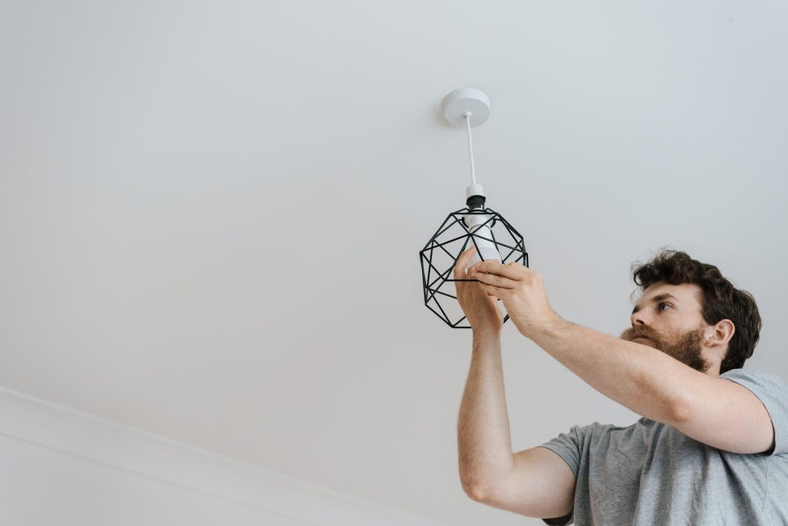 Licensed electrician installing new lights